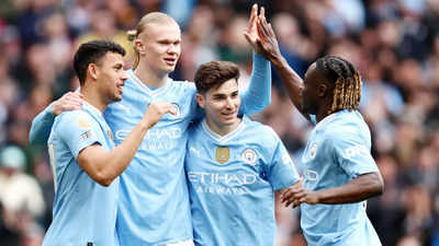 Manchester City hammer Luton 5-1 to move top of the Premier League