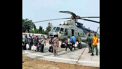 265 officials airlifted to 65 poll stations to avoid Maoist traps