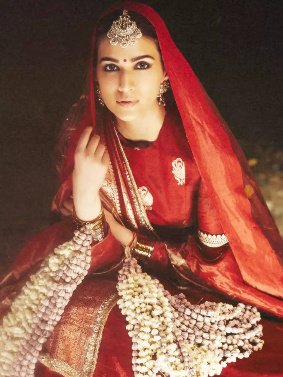 Kriti Sanon exudes fashion inspiration for all the brides-to-be in a  sindoori red lehenga | Times of India