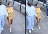 Bianca walks barefoot in Disneyland