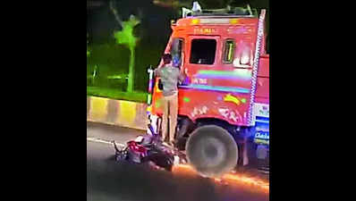 Viral video: Hyderabad man hangs on to truck as driver races away with bike under wheel for 2km