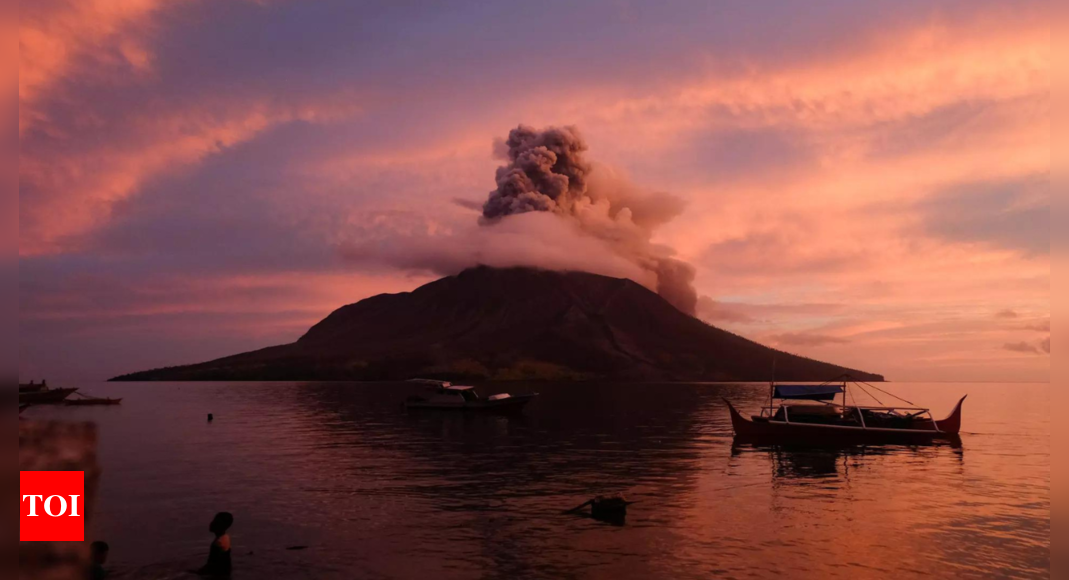 Chinese woman slips into Indonesian volcano while posing for photo, dies – Times of India