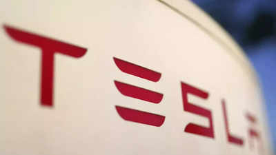 Tesla Q1 profit falls 55%, but stock jumps as company moves to speed production of cheaper vehicles