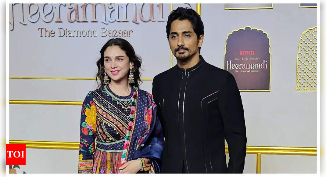 Aditi Rao Hydari and Siddharth make for a stunning couple as they pose for the paparazzi together at Heeramandi premiere – See photos | – Times of India