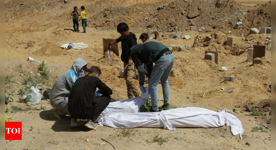 Probe mass graves at Gaza hospitals: UN – Times of India