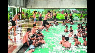 City folk flock to pools to stay cool