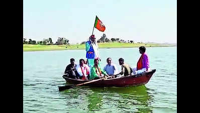 Edu minister takes boat for poll campaign without life jacket