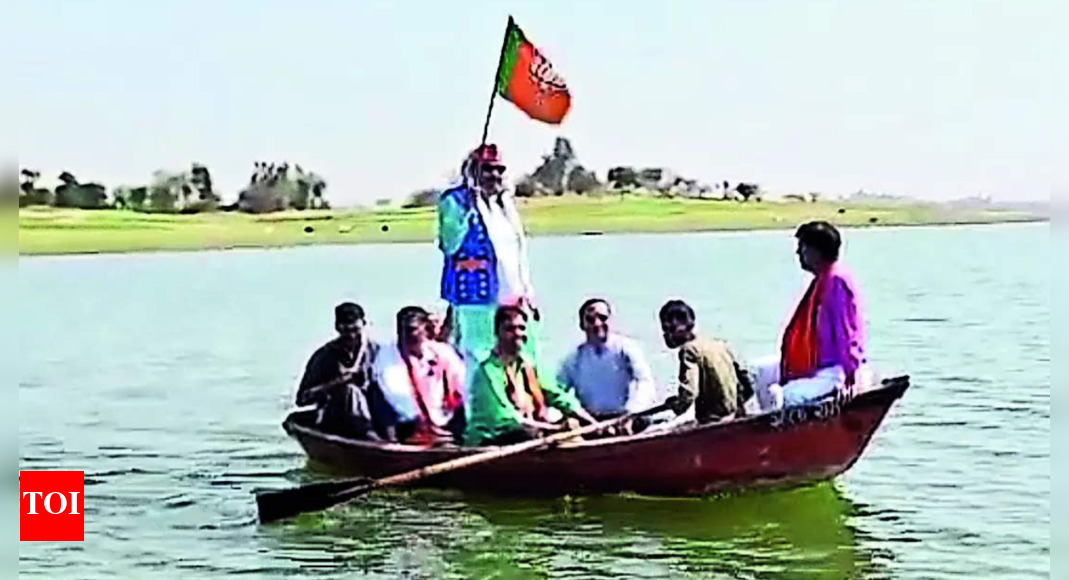 Edu minister takes boat for poll campaign sans life jacket - Vimarsana News