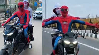 Spiderman, spiderwoman's titanic pose on bike lands them in Delhi Police web