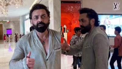 Bobby Deol wins hearts as he tells the bodyguards 'aaram se' as the push the paparazzi, gives them a flying kiss and says 'I love you guys'
