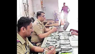 Cops intercept pvt car, seize ₹40L cash in Chembur