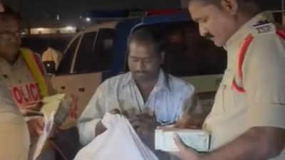 ​Man concealed with currency bundles on his body, caught in Khammam