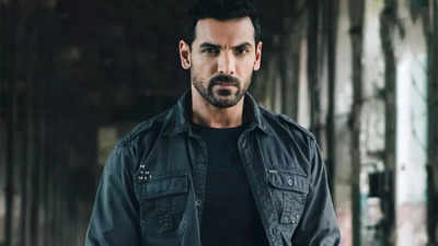 John Abraham gifts expensive shoes to a fan on his birthday, helps him tie the laces