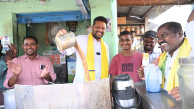 TDP candidate TG Bharat interacts with voters at a tea stall at Kurnool city TG Bharat campaigns at Kurnool market yard where problems are aplenty