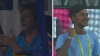 Ball boy over the moon as Jonty Rhodes applauds his stunning catch behind the fence. Watch