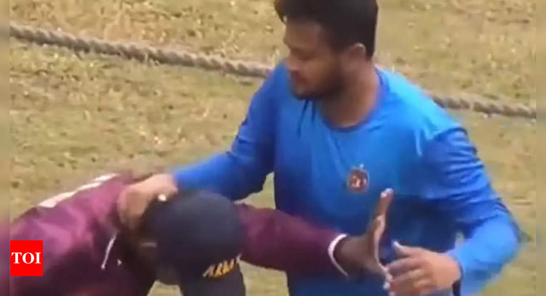 In a shocker, Bangladesh star all-rounder Shakib Al Hasan grabs neck of a selfie-seeking man, tries to snatch phone. Watch | Cricket News – Times of India