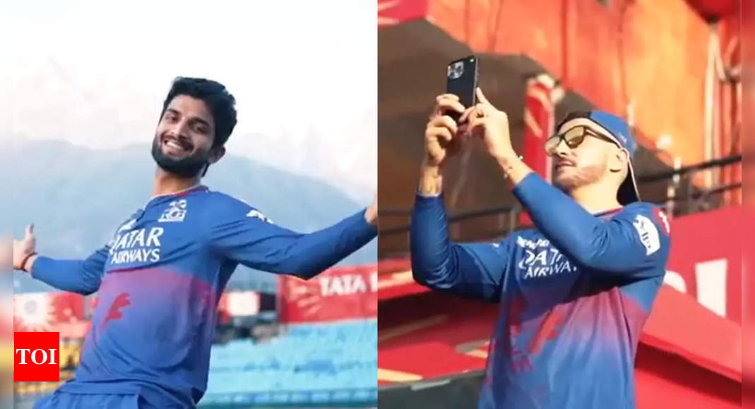 Watch: Mesmerized by picturous Dharamasla ground, RCB players turn into posers and photographers | Cricket News – Times of India