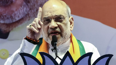 Cong trying to scare India to give POK to Pak: Shah