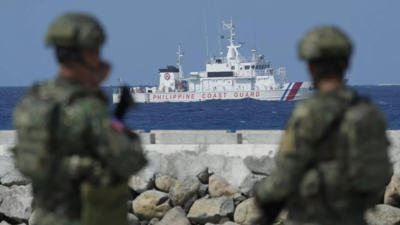 Philippines sends ships to disputed atoll where China building 'artificial island'