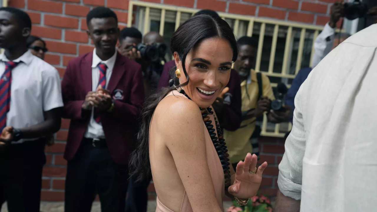 Meghan Markle stirs controversy in Nigeria with 'Windsor dress - Times of  India