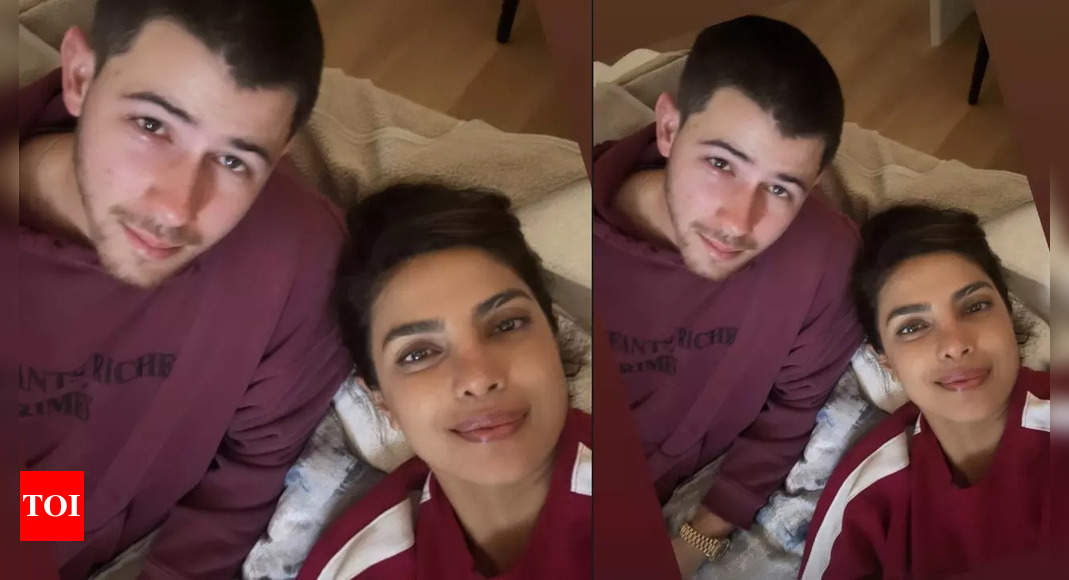 Priyanka Chopra lazy Saturday night with hubby Nick Jonas gives out couple goals – Pic | – Times of India