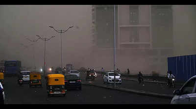 DUST STORM, SHOWERS BRING RESPITE TO CITY