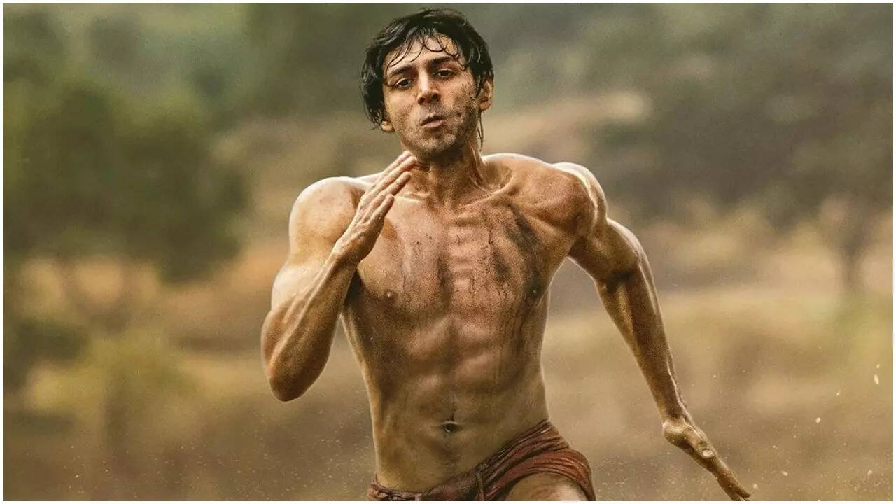 Kartik Aaryan unveils the first look of 'Chandu Champion' and shows off his  toned abs in a red langot | Hindi Movie News - The Times of India