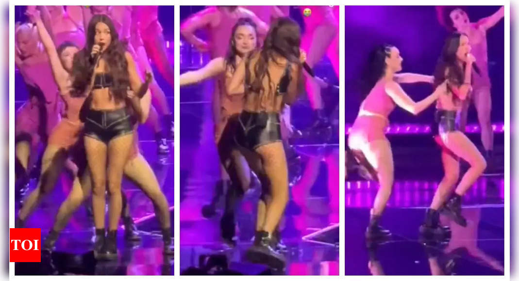 Olivia suffers a wardrobe malfunction on stage
