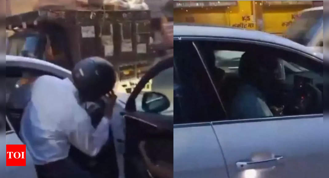 Audi owner fined Rs 1,000 for not wearing a helmet, his response will blow your mind!