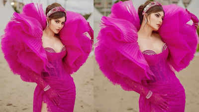 Urvashi Rautela graces the stage of Cannes 2024 in a custom-made fuchsia gown