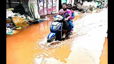 Heavy rains claim one life, flood houses in city areas