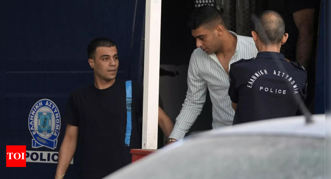 Charges dropped against nine men over 2023 migrant shipwreck off Greece | World News – Times of India