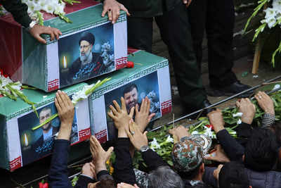 Iran prepares to bury late president, foreign minister and others killed in helicopter crash