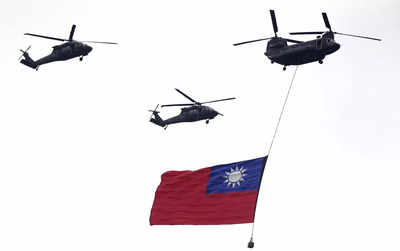 China holds war games around Taiwan, vows flowing blood