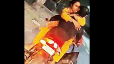 Couple arrested for romancing on bike after video goes viral