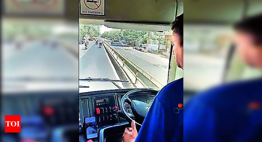 BRTS Bus Driver: Driver watches reels at wheel, operator fined ₹2L ...