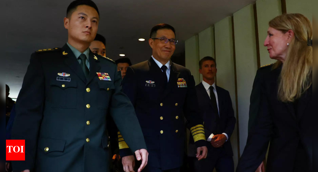 US and Chinese defence chiefs hold rare direct talks in Singapore ...