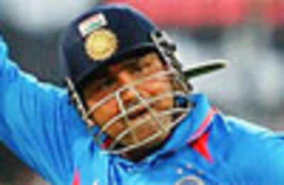 Virender Sehwag was singing Kishore's song during his 219: Raina
