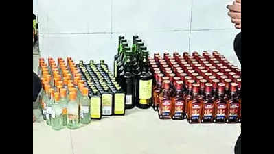 2 smuggling liquor from Daman posing as eunuchs held