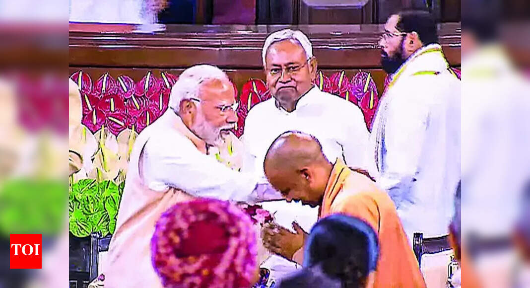 UM CM Yogi Adityanath wishes PM Narendra Modi, calls him charioteer of ...
