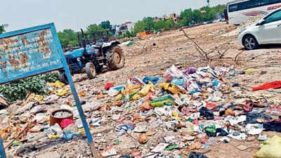 Land near passport office turns a garbage dump, illegal parking lot