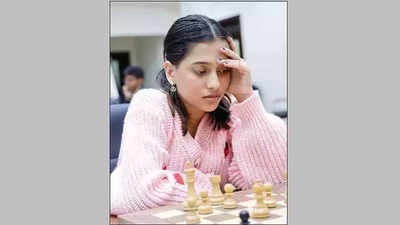 Divya Deshmukh holds her fort well on top with sole lead in world junior chess