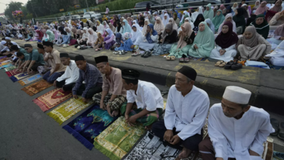 Muslims in Asia celebrate Eid al-Adha with sacrifice festival and traditional feast