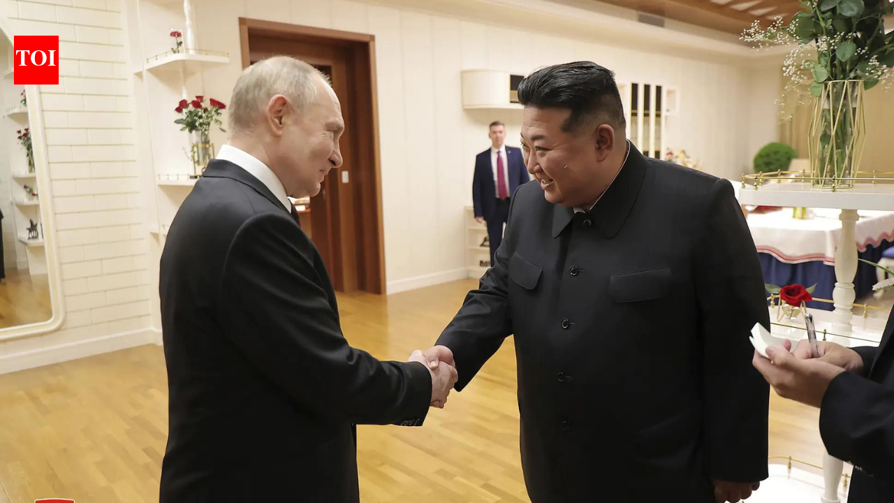 Vladimir Putin embraced with smiles, handshakes, and hugs from Kim Jong ...