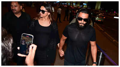 Ranveer Singh gets protective of pregnant wife Deepika Padukone amidst media frenzy as they jet out of city post 'Kalki 2898 AD' event - WATCH