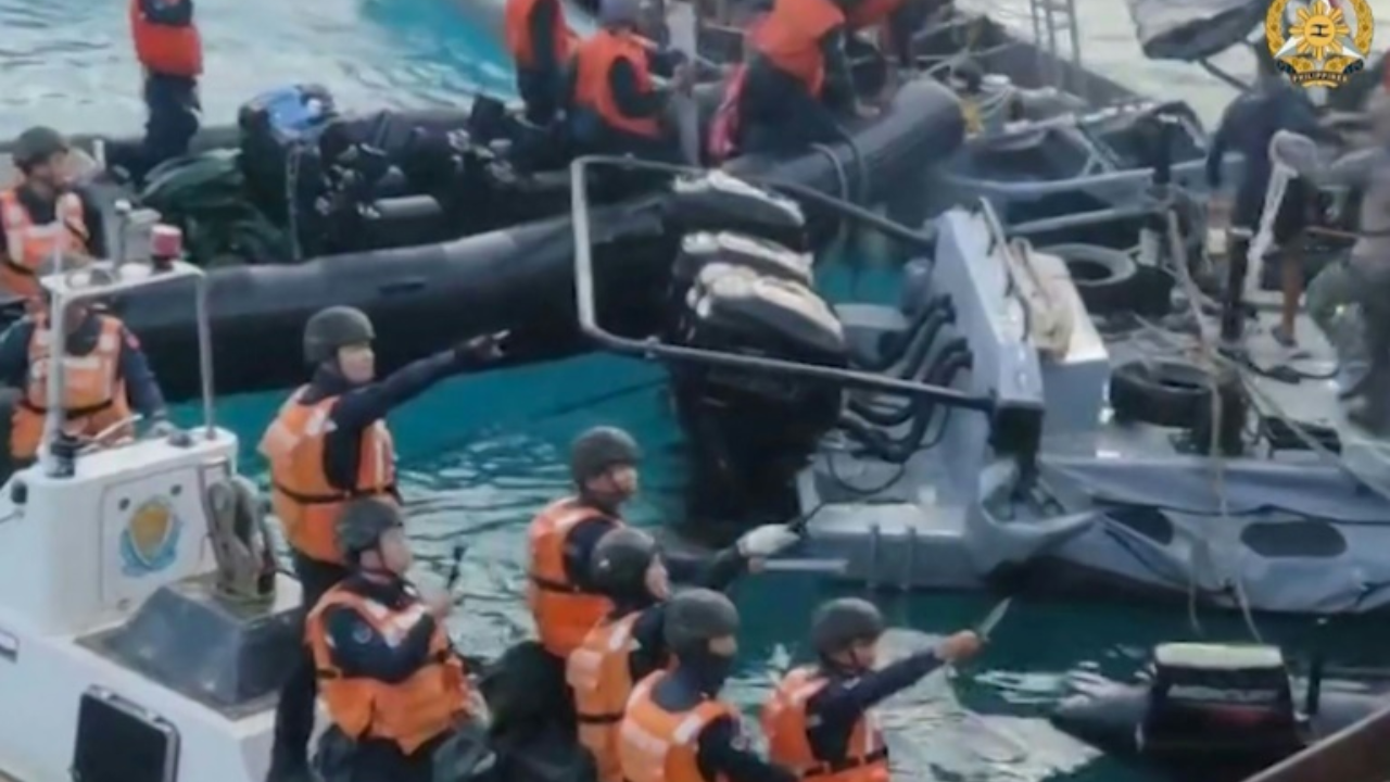 Sticks, knives and axe': Watch Chinese sailors clash with Philippines at disputed South China Sea - Times of India