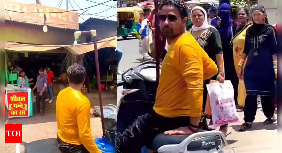 Watch: Jodhpur man installs shower on Honda Activa to combat heatwaves, India really isn’t for beginners!