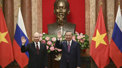 Russian President Vladimir Putin signs multiple deals with Vietnam in bid to shore up ties in Asia