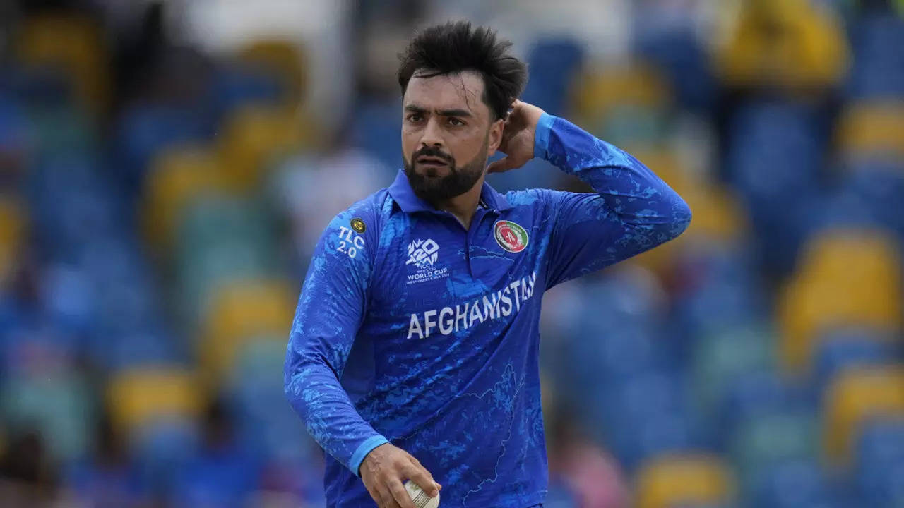 ICC reprimands Rashid Khan for throwing bat on the ground during T20 World Cup match – Times of India