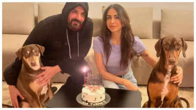 John Abraham and wife Priya Runchal pose for the cutest family picture as they celebrate their pooch's birthday
